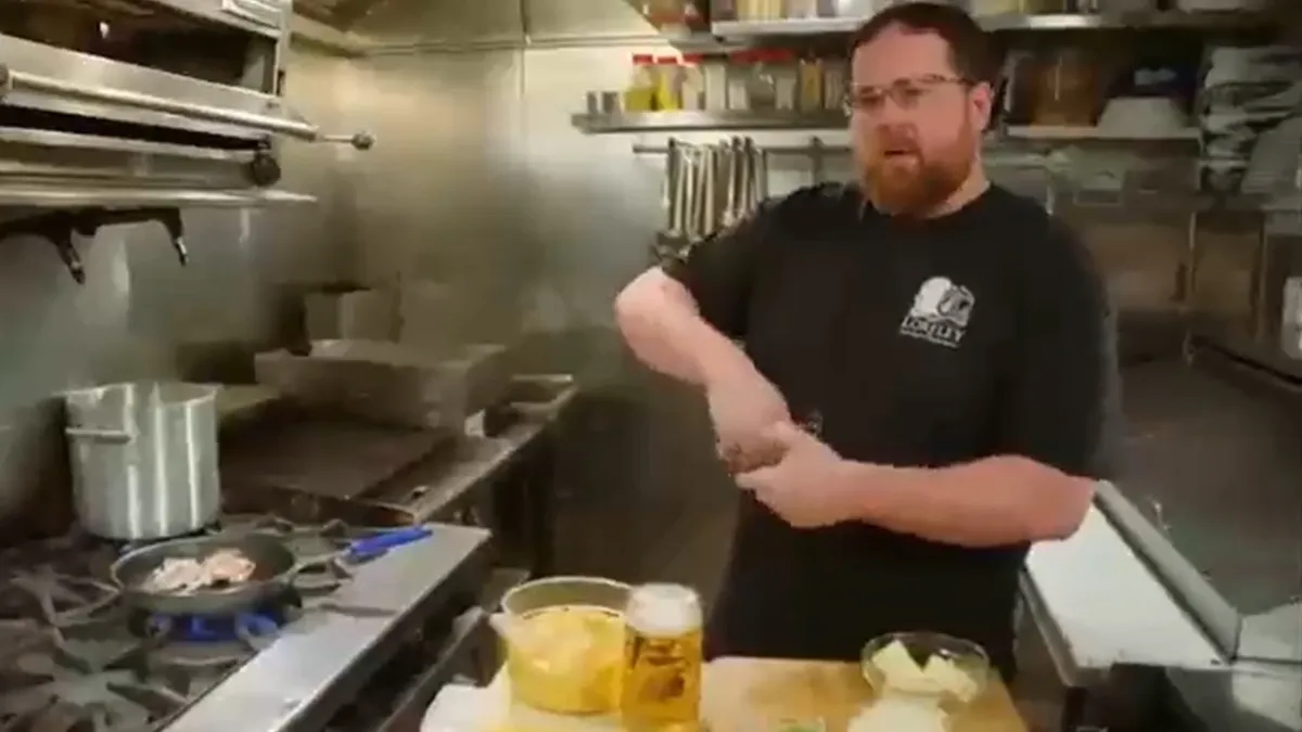 Doug Jacobson cooking in the Loreley kitchen on Food Paradise