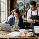 Restaurant owner planning marketing strategy with chef