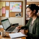 Restaurant manager checks marketing performance report