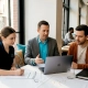 Team planning campaign in restaurant setting