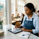 Restaurant manager reviewing marketing analytics