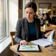 Restaurant manager reviewing seasonal marketing calendar