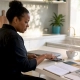 Caterer responding promptly to inquiry at desk