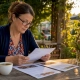 Restaurant owner reviewing customer testimonials