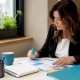Restaurant manager reviewing catering marketing documents
