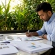 Event planner reviewing catering packages
