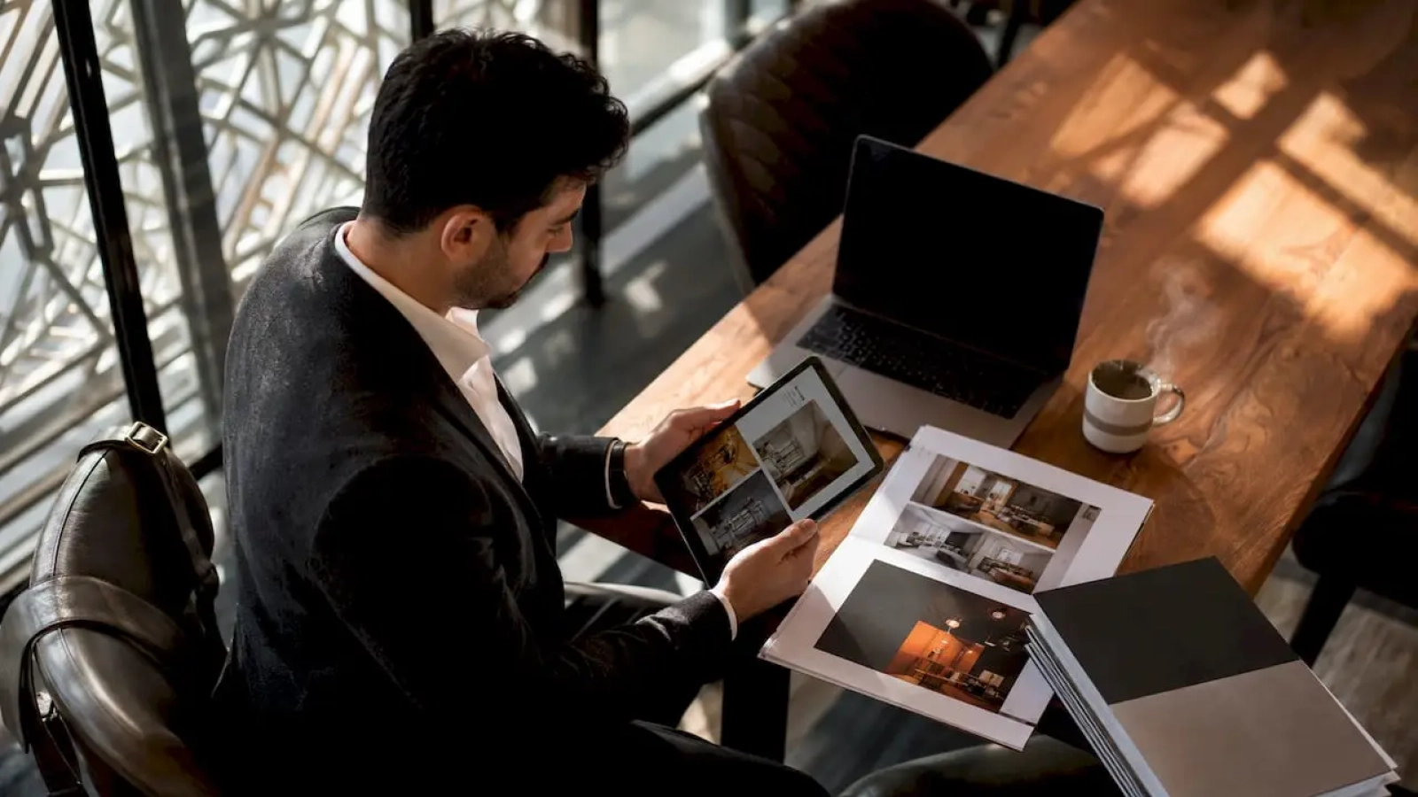 Consultant comparing restaurant marketing agency materials