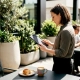 Restaurant manager reviewing marketing data on tablet