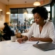 Restaurant owner reviewing catering menus