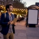 Marketing manager assessing restaurant outdoor ads
