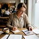 Restaurant owner preparing promotional content at desk