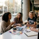 Diverse group discussing restaurant influencer partnership
