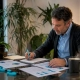 Marketing manager reviewing restaurant customer segments