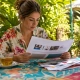 Restaurant marketer reviewing social media campaign report