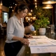 Manager reviewing restaurant analytics platform comparisons