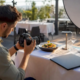 Photographer setting up camera for restaurant shoot