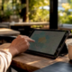 Hand pointing to ZIP codes on restaurant neighborhood map